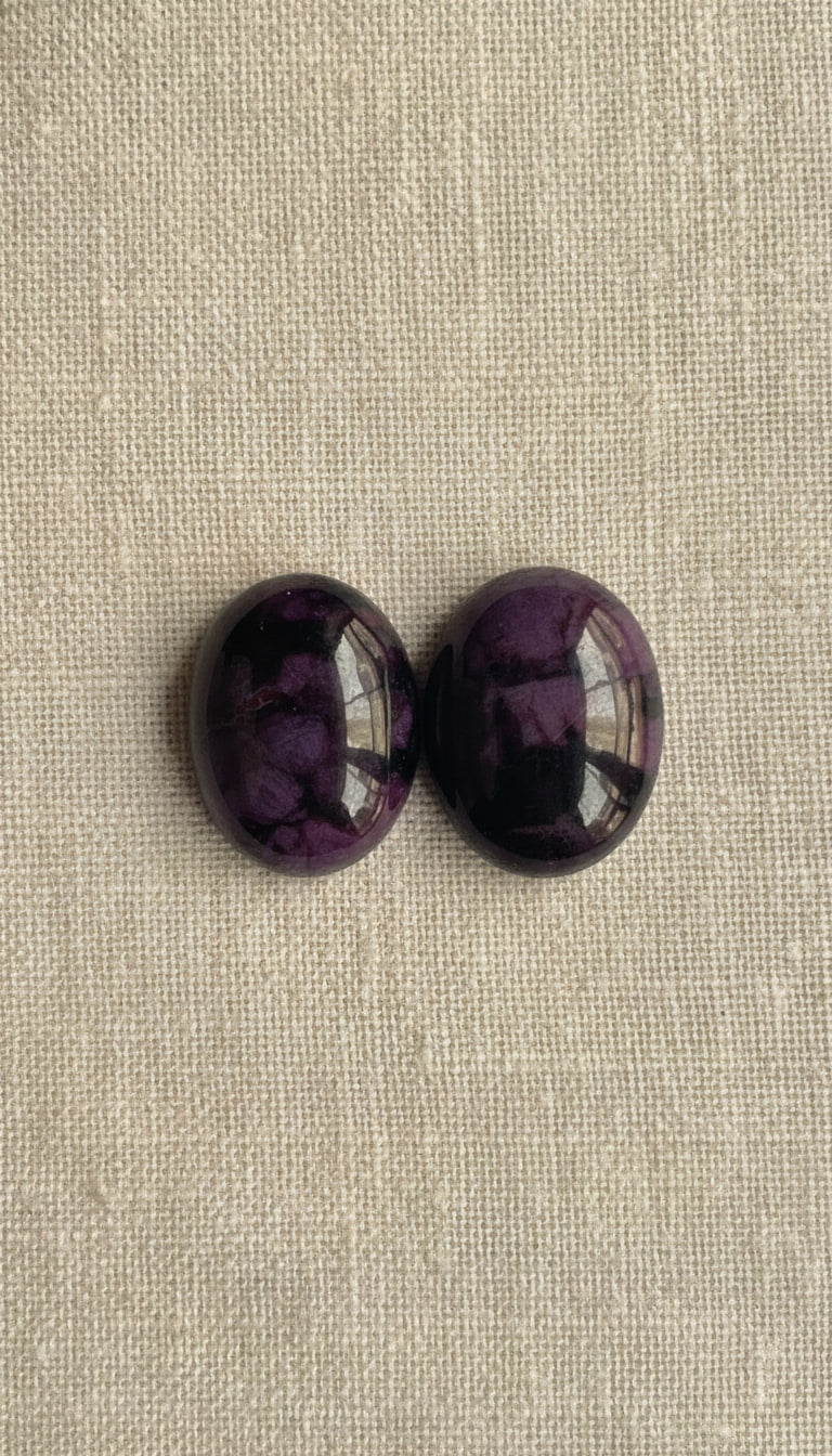 Sugilite from South Africa, hand-graded by The Stone Atlas, lot XA52